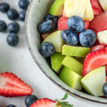 Close-up of a fruit salad made with watermelon, pineapple, green apple, strawberry and blueberry