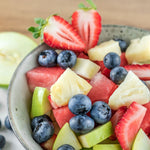 Close-up of a fruit salad made with watermelon, pineapple, green apple, strawberry and blueberry